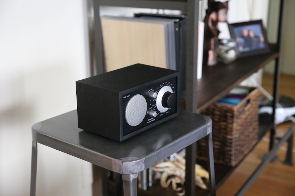 Tivoli-Audio-Model-One-BT-on-a-Chair